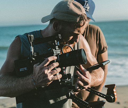 crew filming on beach - Crew Connection